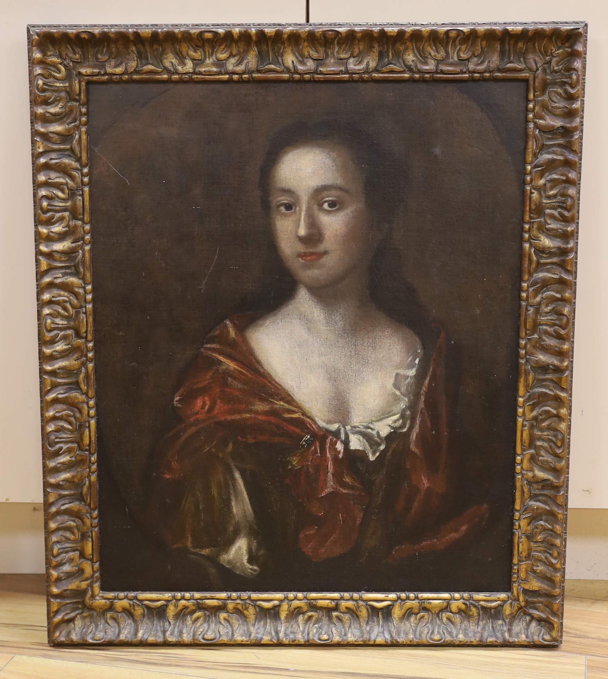 18th century English School, oil on canvas, Portrait of a lady, feigned oval, 63 x 52cm